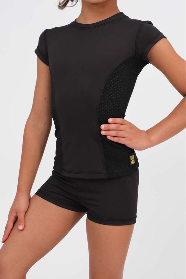 The Flawless training uniform, a black mesh-panelled top and shorts